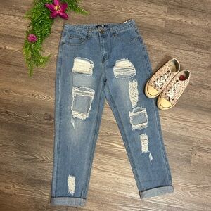 Distressed Blue Denim Jeans